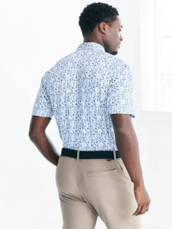 Blanc - Polo de golf à imprimé géométrique actif