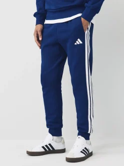 Bleu - adidas Essentiels Pantalon de jogging polaire à rayures 3