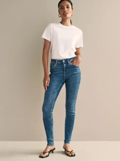 Bleu foncé de denim - Jean skinny super doux