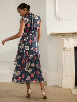 Bleu marine à fleurs - Robe longue imprimée à col haut et à volants