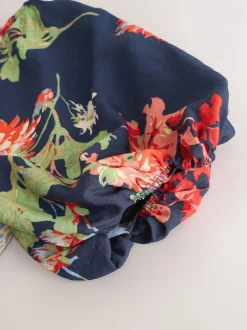 Bleu marine à fleurs - Robe mi-longue imprimée à manches bouffantes