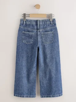 Bleu moyen - Jean orné d’un large imprimé fleuri (3-16ans)