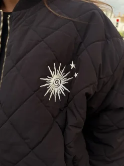 Blouson bomber matelassé doublé de fourrure Never Fully Dressed