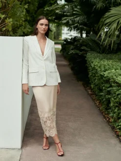 Champagne doré - Jupe mi-longue en satin bordée de dentelle