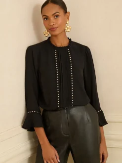 Coeur noir - Love & Roses chemisier à manches flûte avec détail matériel