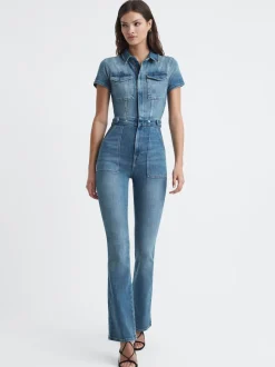 Combinaison en denim Good American évasée en bas