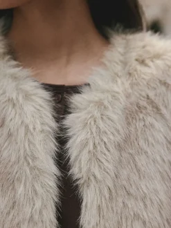 Crème - Veste sans manches en fausse fourrure