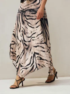 Écru imprimé zèbre - Jupe mi-longue asymétrique en satin effet froissé