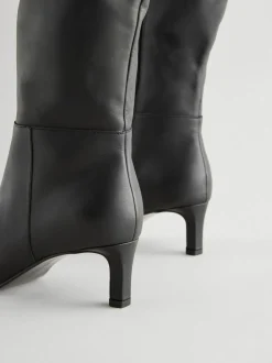 Cuir noir - Bottes skinny à talons hauteur genou