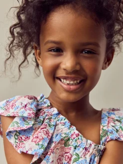 Ditsy rose - Combinaison à épaules volantées (3-16ans)