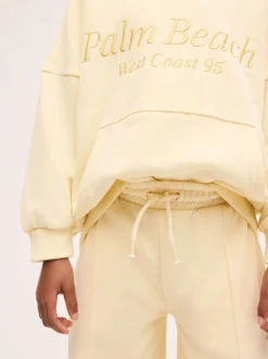 Détail jaune brodé - Sweat à capuche (3-16 ans)