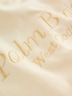 Détail jaune brodé - Sweat à capuche (3-16 ans)