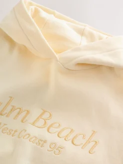 Détail jaune brodé - Sweat à capuche (3-16 ans)