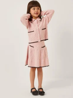 Ensemble Monsoon cardigan à col nœud et jupe en maille