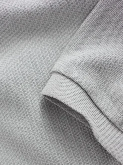Gris - Polo texturé élégant à col zippé