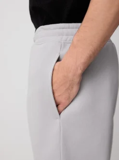 Gris - Short à poche zippée en jersey brossé