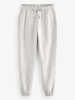 Gris - soi-même. Jogging à poignets