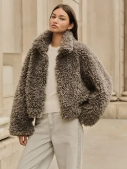 Gris - Veste zippée à col cheminée en fausse fourrure