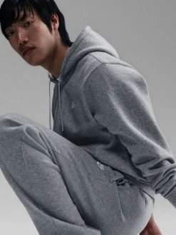 Gris foncé chiné - Pantalon de jogging Nike Club en polaire coupe large