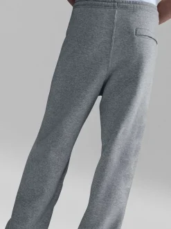 Gris foncé chiné - Pantalon de jogging Nike Club en polaire coupe large