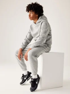 Gris foncé chiné - Pantalon de jogging Nike Club en polaire