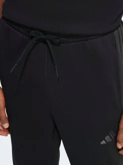 Ground noires - adidas Essentiels Pantalon de jogging polaire à rayures 3