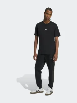 Ground noires - adidas Essentiels Pantalon de jogging polaire à rayures 3