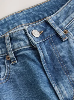 Jean bleu moyen - Jean ajusté extensible taille milieu Hourglass