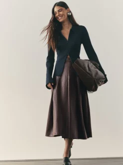 Jupe Kilt mi-longue Nodinary en similicuir