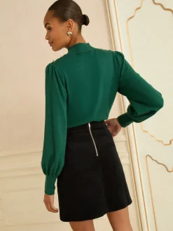 Love & Roses jupe courte en velours côtelé