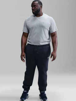 Marine d'Obsidienne - Pantalon de jogging Nike Club en polaire