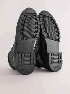 Noir - Bottes zippées en cuir doublées de peau de mouton