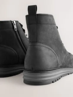 Noir - Grandes bottes en cuir à bout tablier