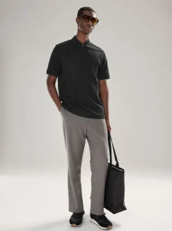 Noir - Polo texturé élégant à col zippé