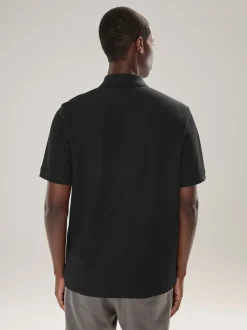 Noir - Polo texturé élégant à col zippé