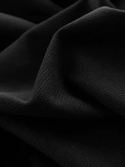 Noir - Polo texturé élégant à col zippé