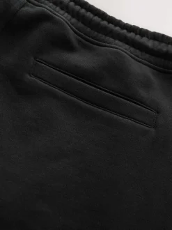 Noir - Short à poche zippée en jersey brossé