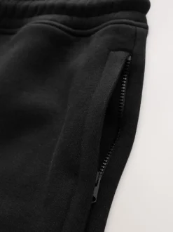 Noir - Short à poche zippée en jersey brossé