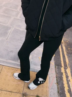 Noir brodé - Leggings évasés en coton Never Fully Dressed