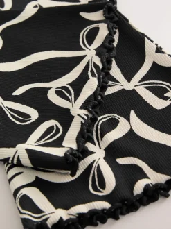 Nœud noir/blanc - Leggings évasés à côtes (3-16ans)