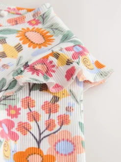 Orange à petites fleurs - Haut côtelé à volants et manches longues (3mois à7ans)