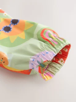 Personnage vert - Combinaison imperméable imprimée (6 mois-7 ans)