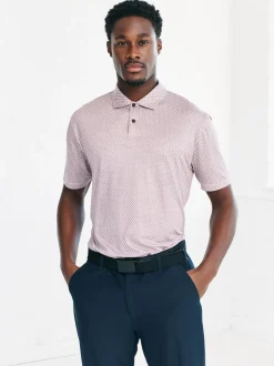 Rose - Polo de golf à imprimé géométrique actif