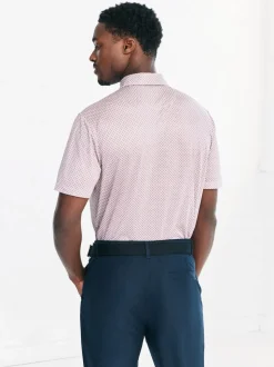 Rose - Polo de golf à imprimé géométrique actif