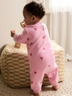 Rose imprimé cœur - Barboteuse bébé en jersey (0mois à3ans)