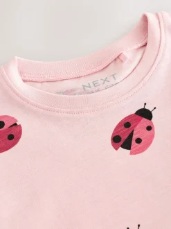 Rose motif coccinelles - T-shirt péplum à manches courtes (3mois-7ans)