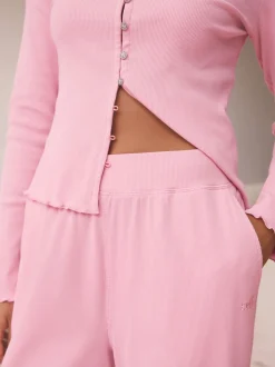 Rose vif - soi-même. Pyjama côtelé boutonné