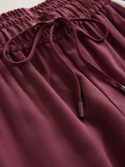 Rouge bordeaux - Pantalon large à bande latérale