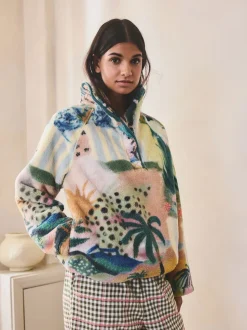 Scène tropicale orange - Haut en polaire imprimée en peau de mouton