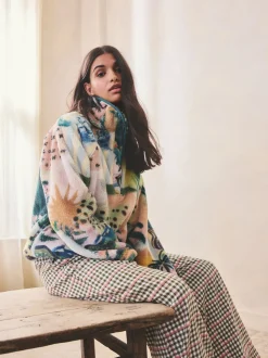 Scène tropicale orange - Haut en polaire imprimée en peau de mouton